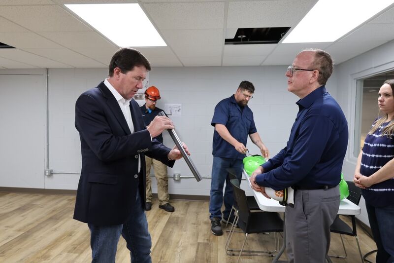 US Senator Bill Hagerty examining steel tube product during facility visit